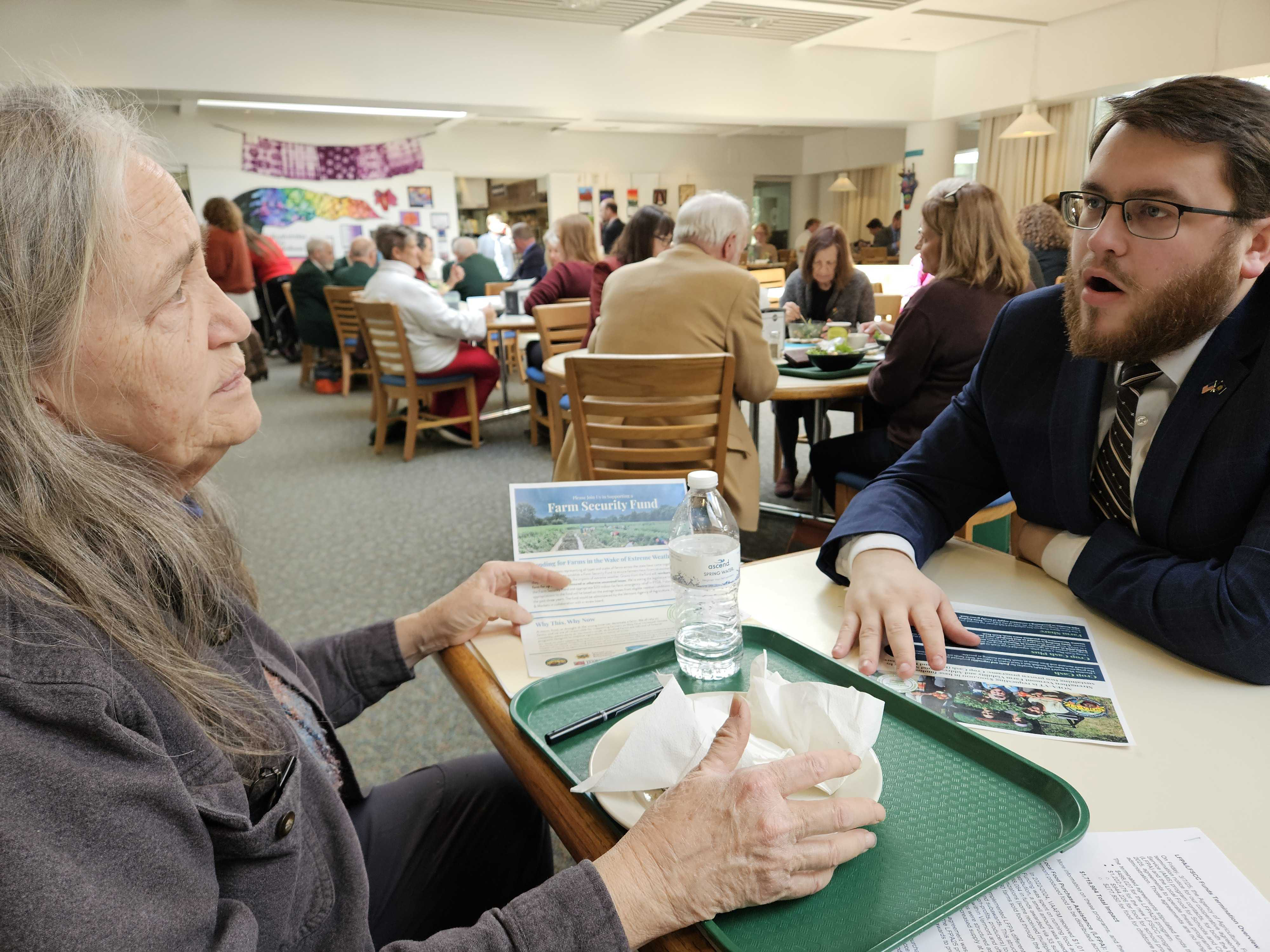 NOFA-VT member Peggy Newfield chats with Vermont Senator Samuel Douglass about the importance of the Farm Security Fund