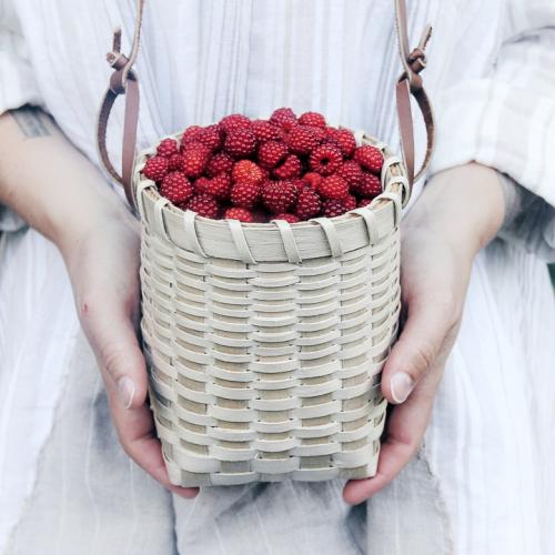 Black Ash Berry Basket filled with Raspberries