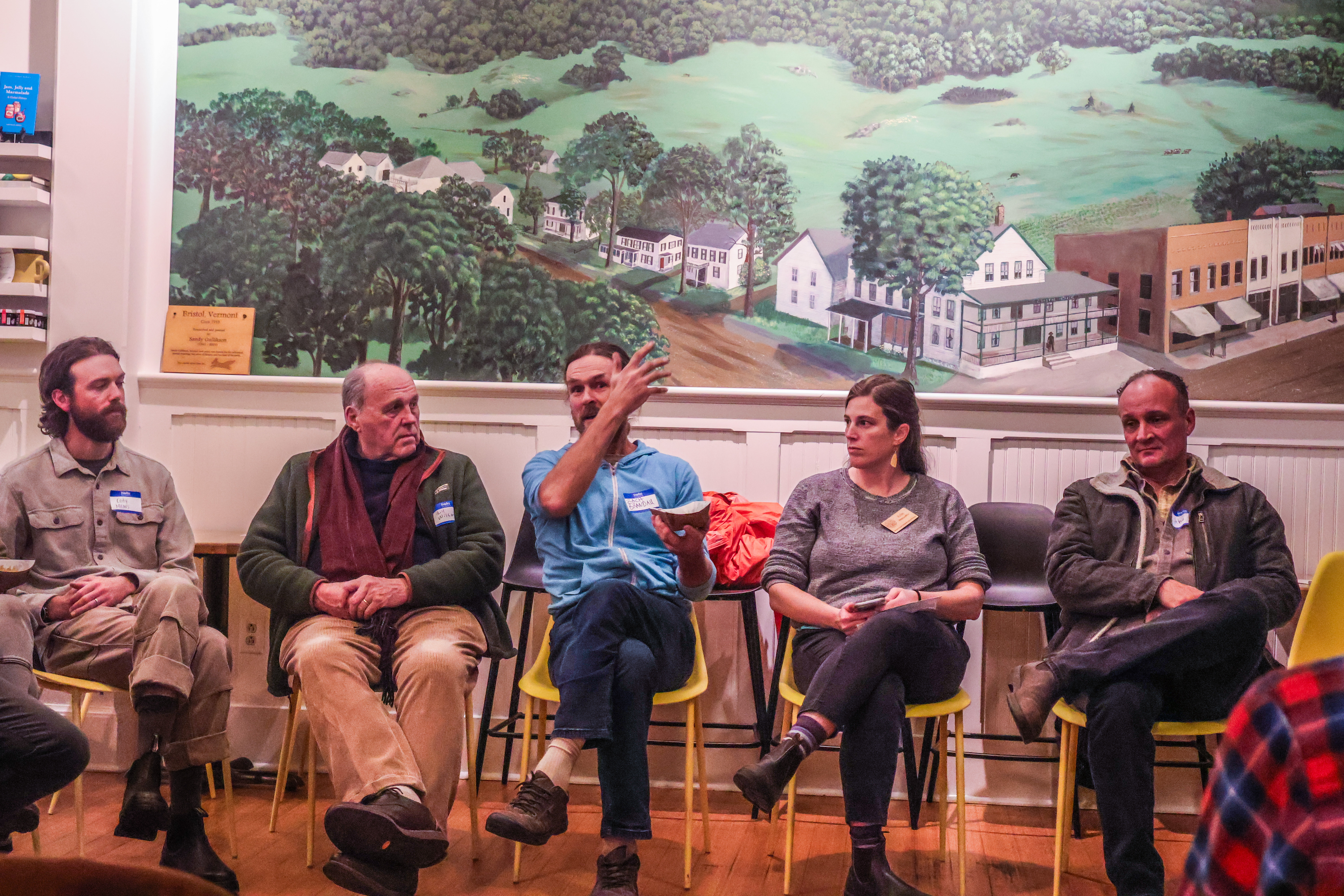 NOFA-VT farmer-member Zach Brandau of Flack Family Farm shares a perspective at the recent Member Meeting while other NOFA-VT members listen intently.