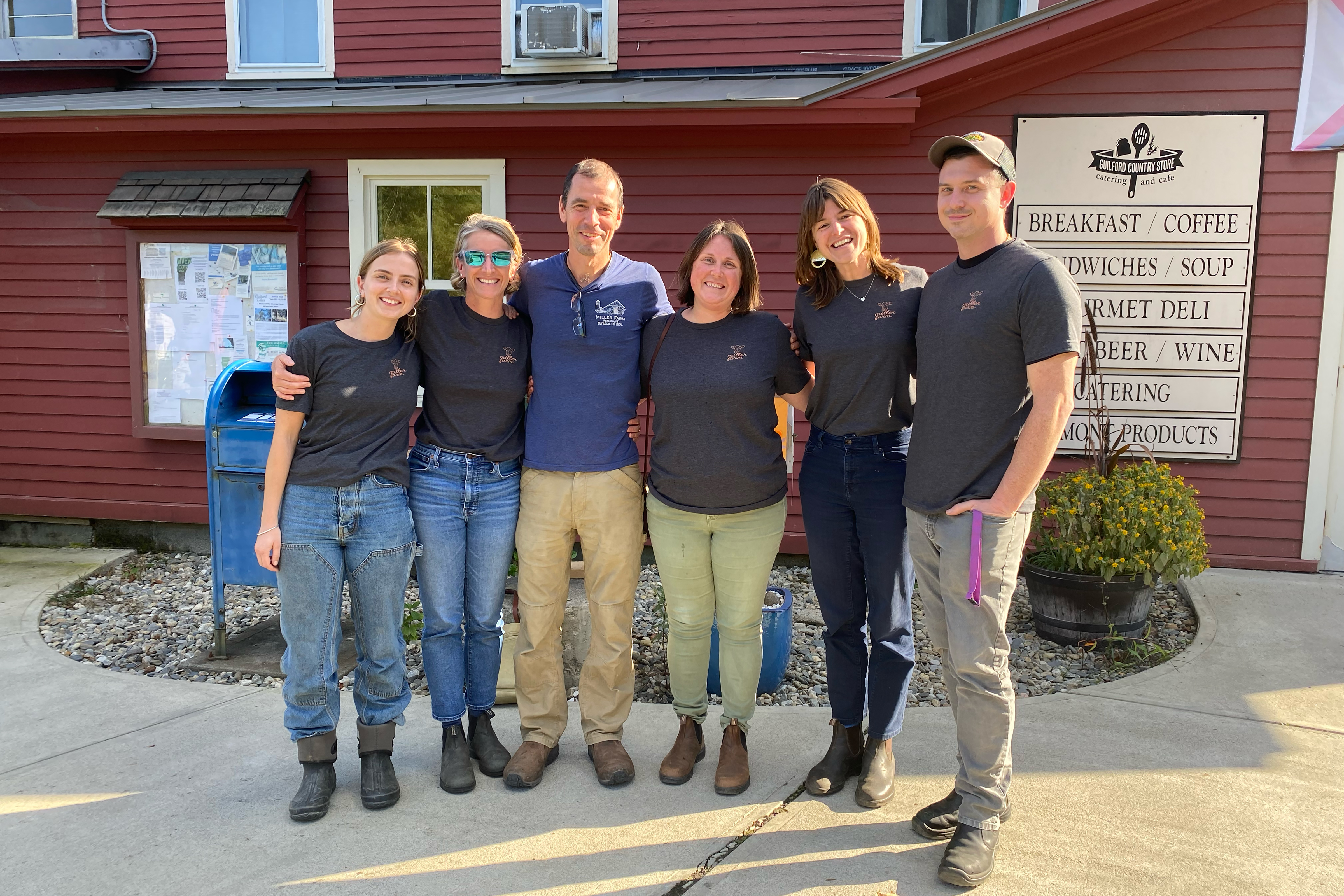 NOFA-VT staff members involved in the Miller Farm School Milk Pilot project are pictured with farmer Peter Miller, Olga Moriarty, Northeast Organic Family Farm Partnership Executive Director, and Harley Sterling, Director of School Nutrition for Windham Northeast Supervisory Union.