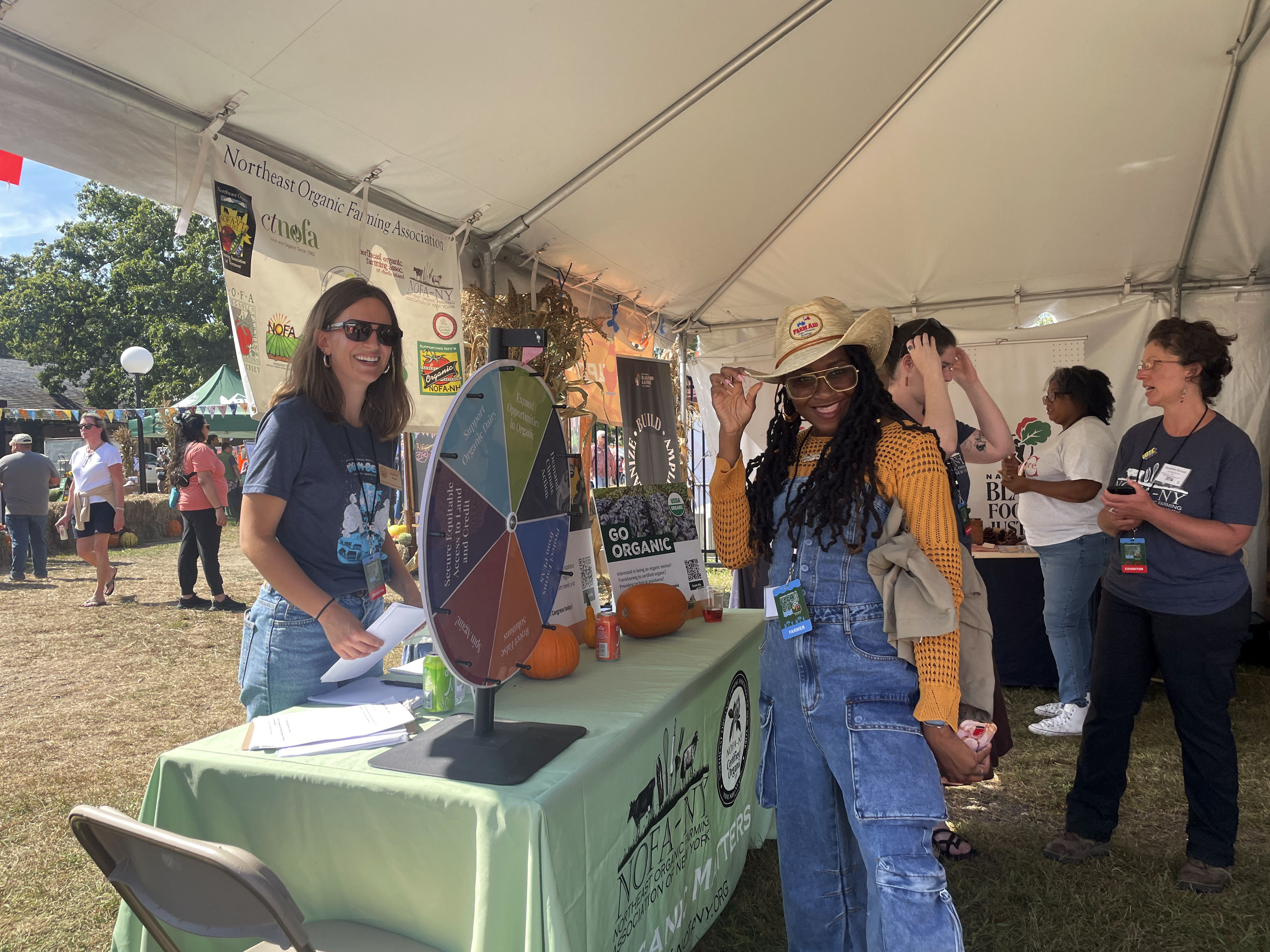 NOFA-VT Lindsey Brand, NOFA-VT's Marketing & Communications Director is pictured at Farm Aid with  Nikiya Ellis of the Agrarian Trust