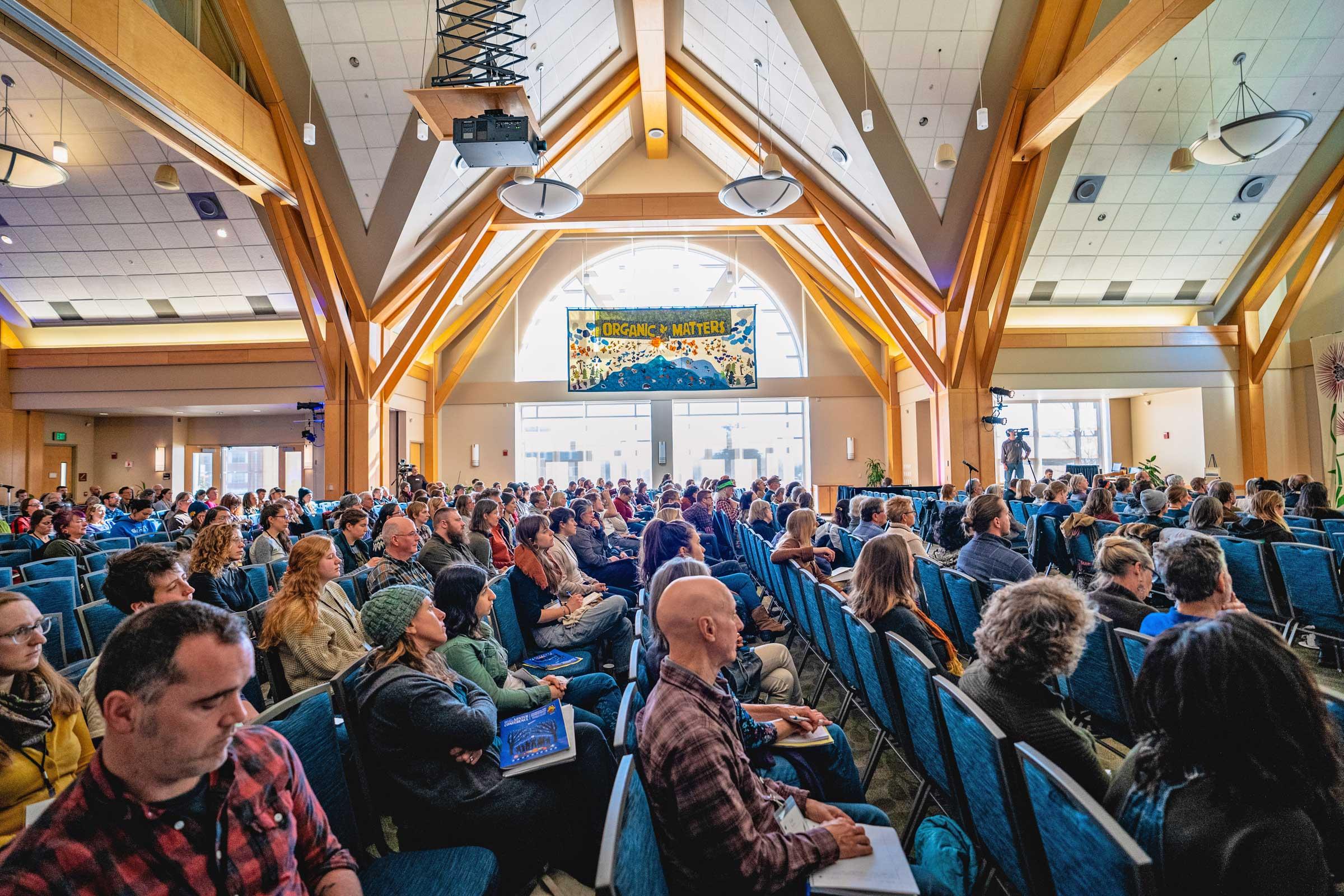 Crowd at UVM's Davis Center during a NOFA-VT Winter Conference