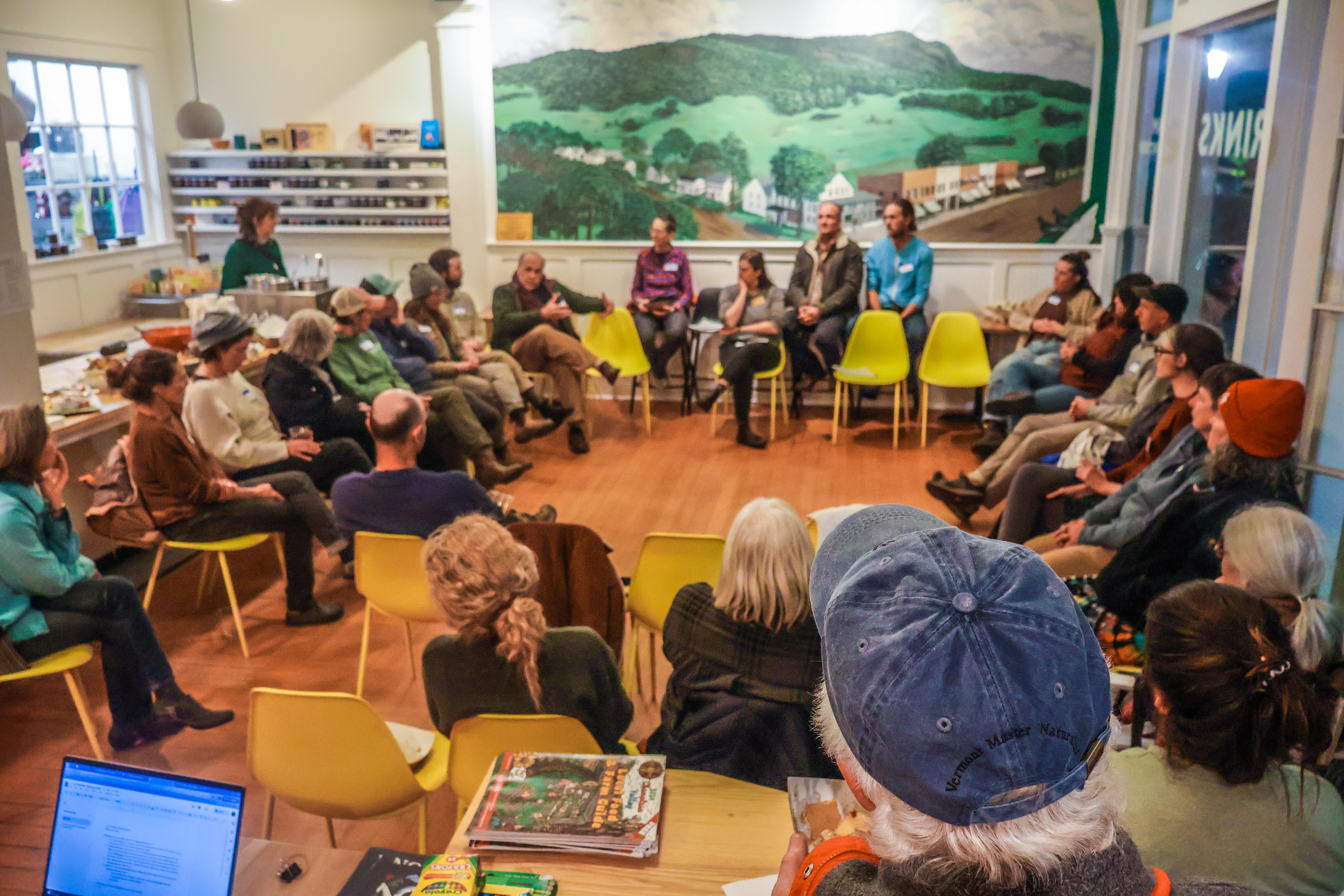 NOFA-VT members seated in a circle at a recent member meeting hosted by Minifactory in Bristol