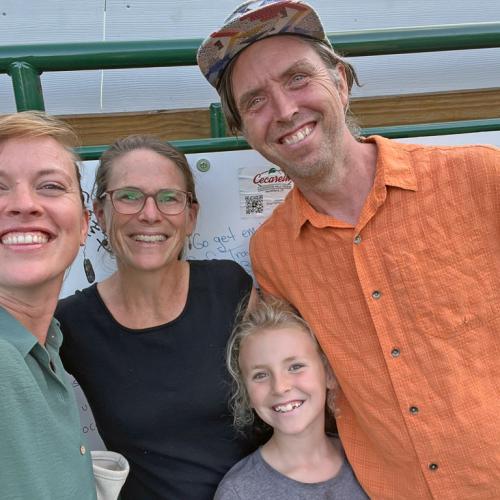 Maddie Kempner, NOFA VT Policy & Organizing Director pictured with NOFA-VT Board Member Becky Maden, her partner Scott Greene of Singing Cedars Farmstead, and their daughter, Ruth.